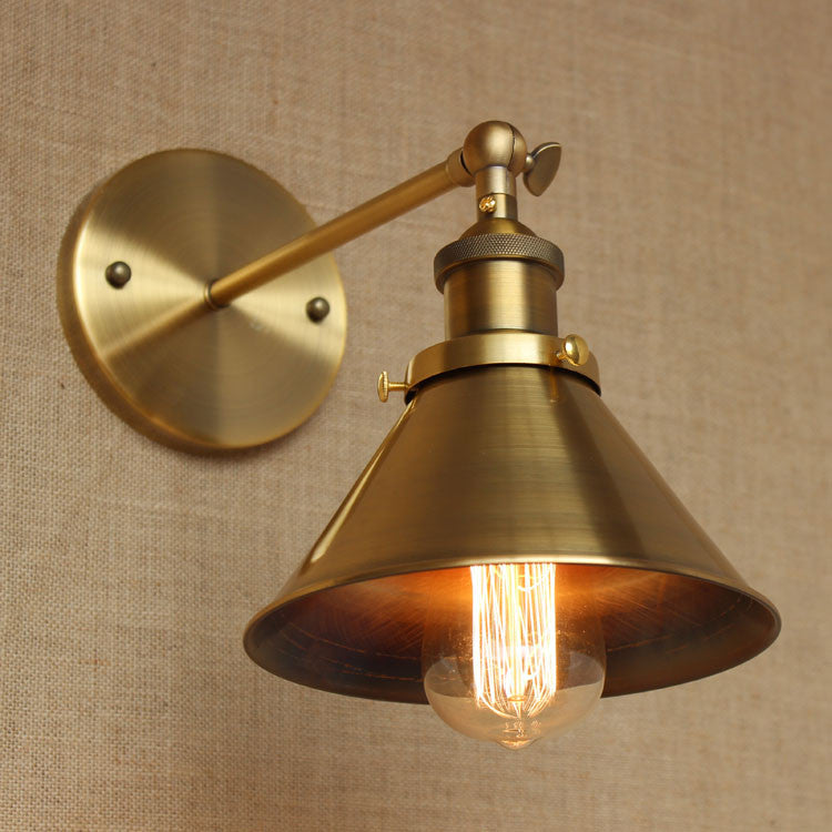 Brass cone shade wall light